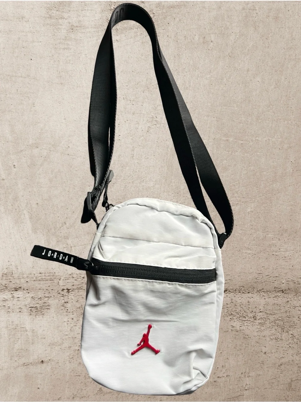 Jordan White Crossbody Bag with Black Strap and Red Logo